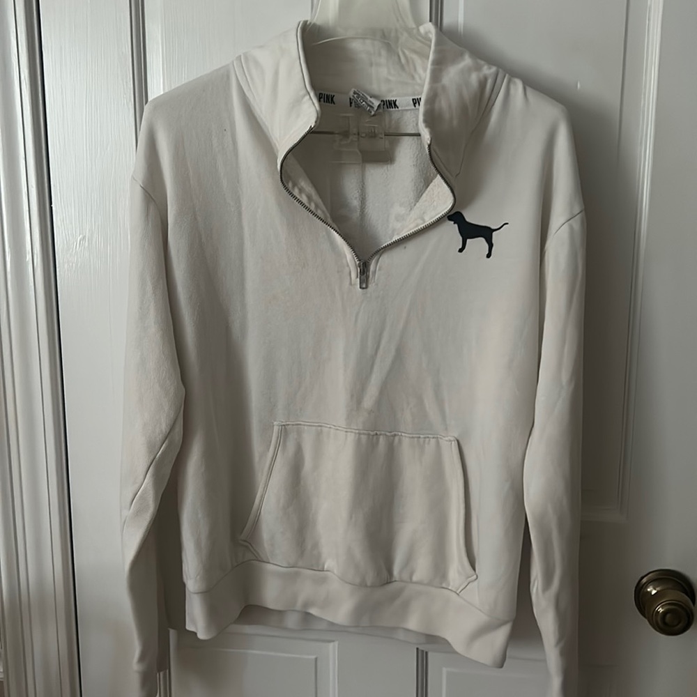 Pink brand pull over.